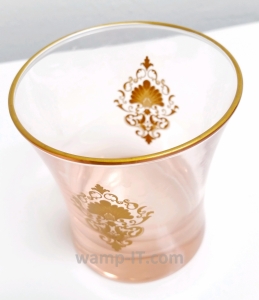 Glass with pad-printed gold color design